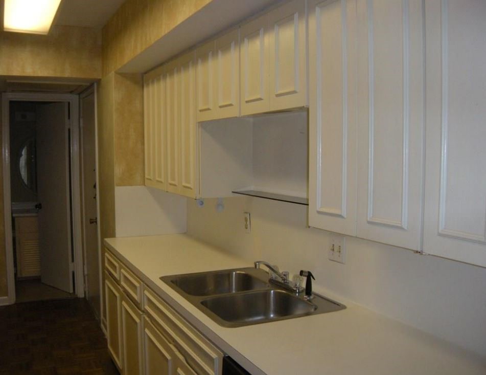 2704 San Pedro Street, Unit 2 Austin, TX 78705 - Photo 10 of 23 a kitchen with a sink and cabinets