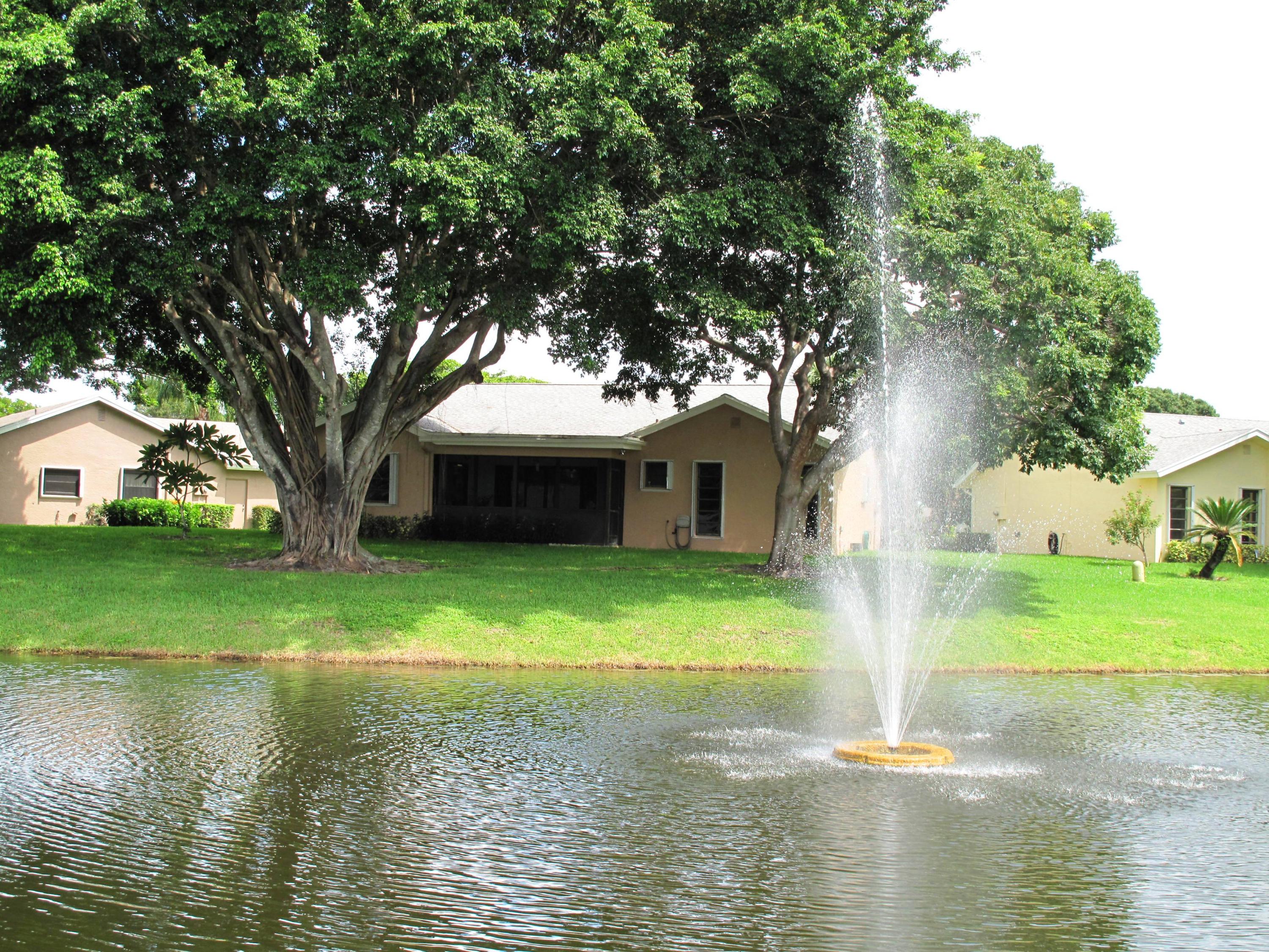 10740 180th Place South Boca Raton, FL 33498 - Photo 31 of 59 Back yard view of home and lake (1)