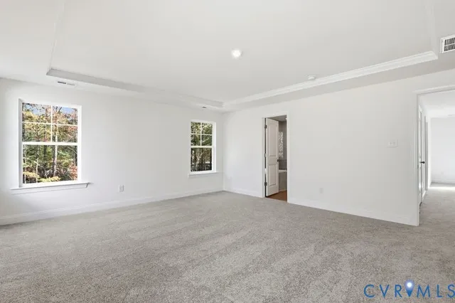 an empty room with windows