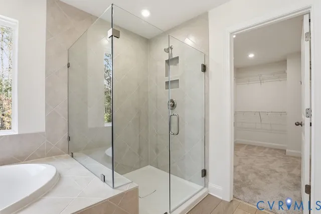 a bathroom with a sink and shower