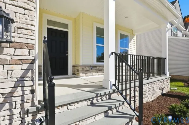 a view of a balcony with a potted plant