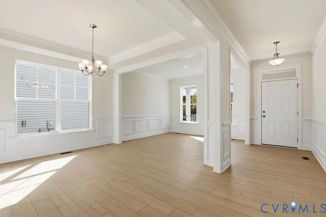 a view of livingroom with window ceiling fan and hardwood floor