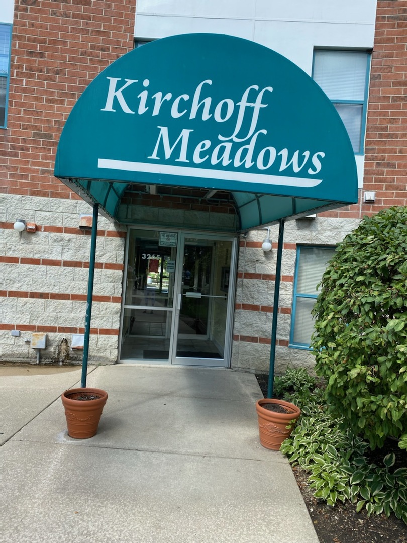 3275 Kirchoff Road, Unit 331 Rolling Meadows, IL 60008 - Photo 1 of 1 a front view of a building
