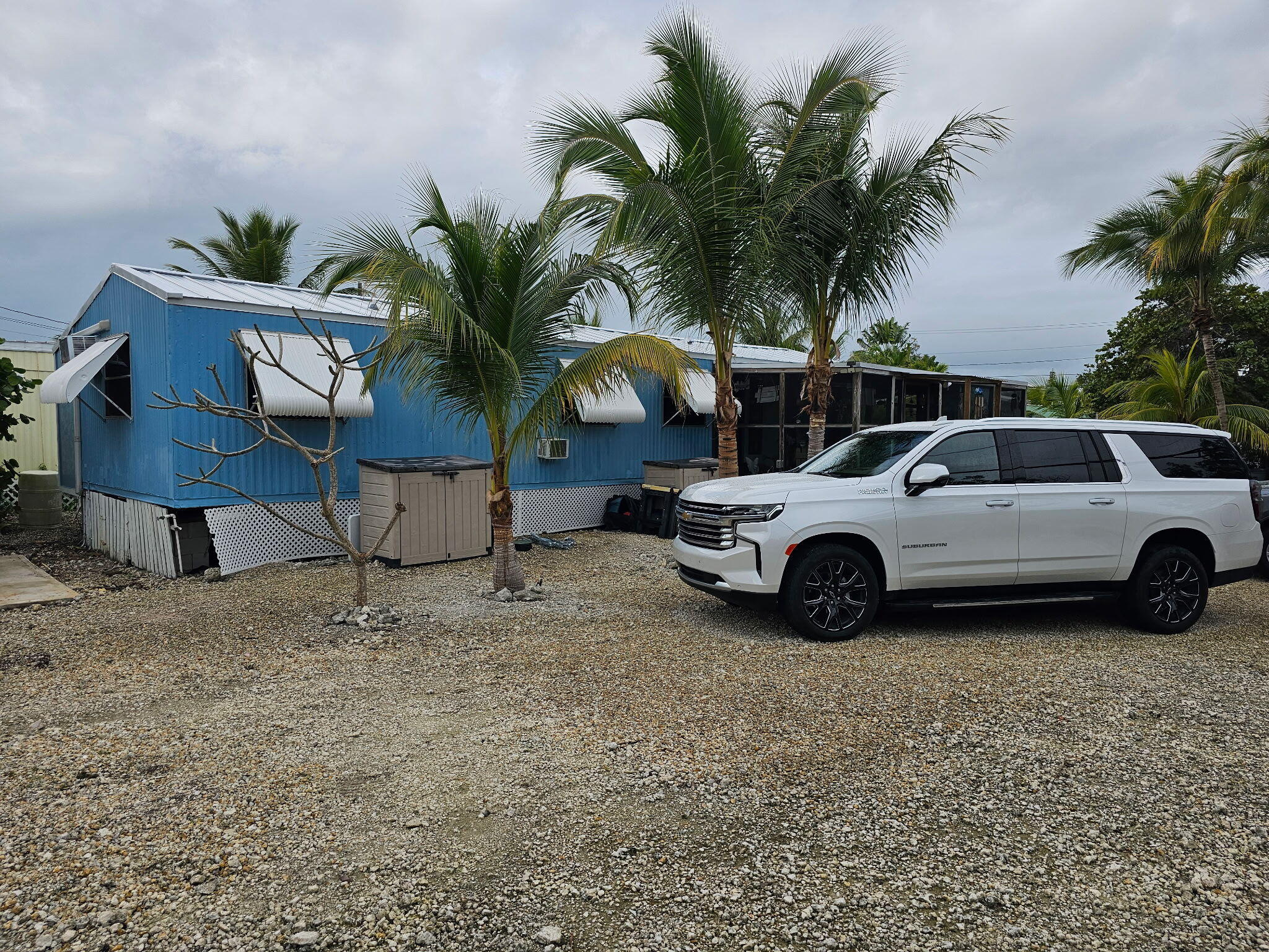 27997 Coral Shores Road Summerland Key, FL 33042 - Photo 27 of 28 a view of a car parked in front of a house