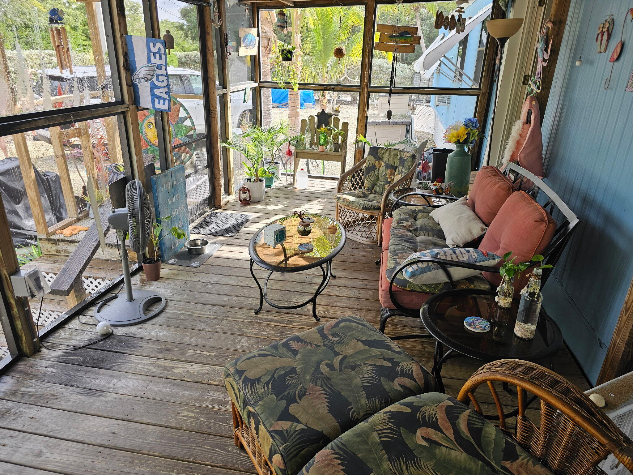27997 Coral Shores Road Summerland Key, FL 33042 - Photo 8 of 28 a living room with furniture and a floor to ceiling window