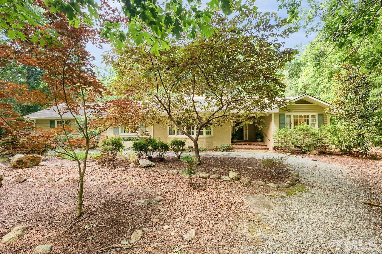 One level home on private two-acre cul-de-sac lot.