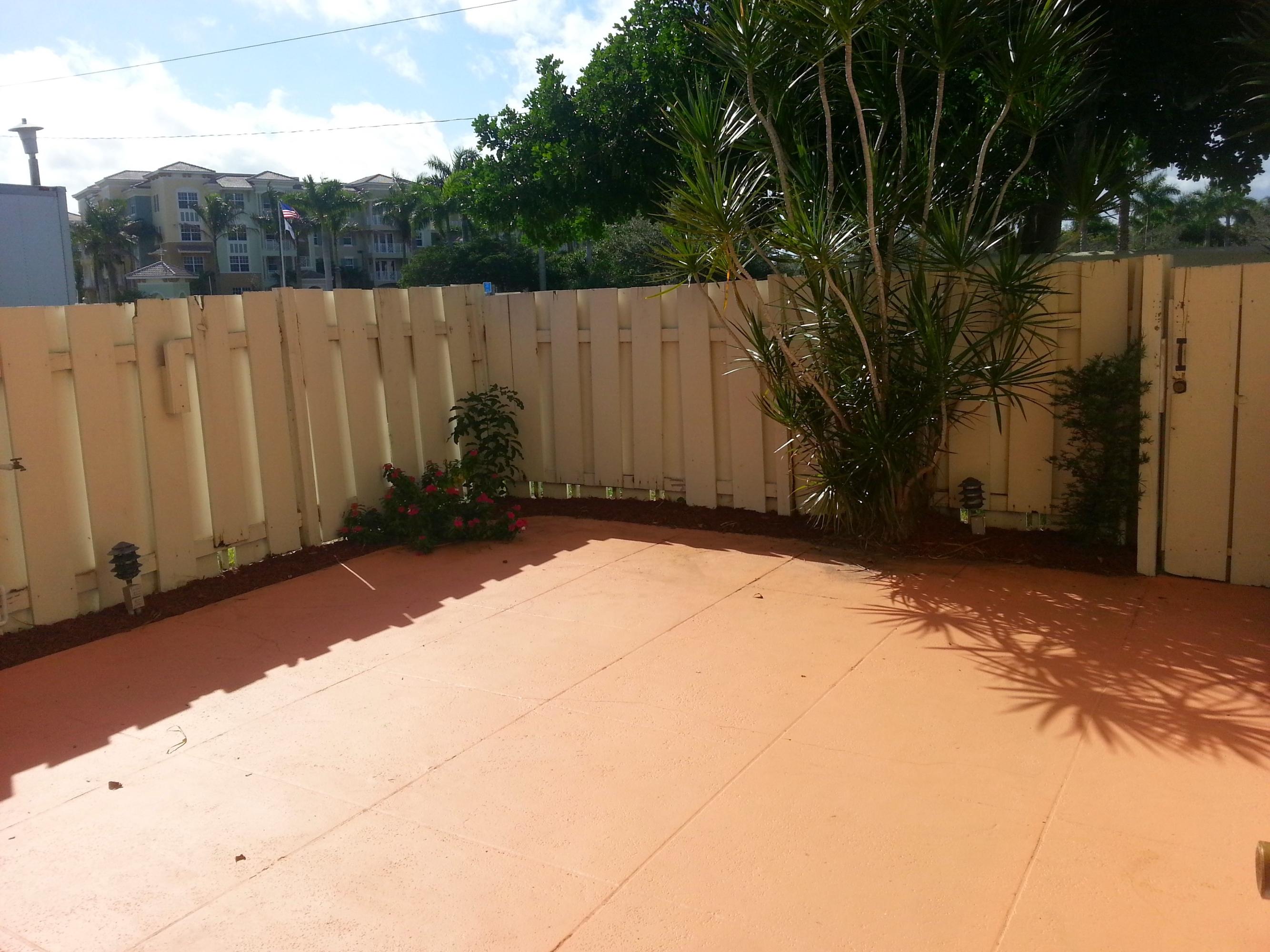 169 Seabreeze Circle Jupiter, FL 33477 - Photo 21 of 25 Private Fenced courtyard