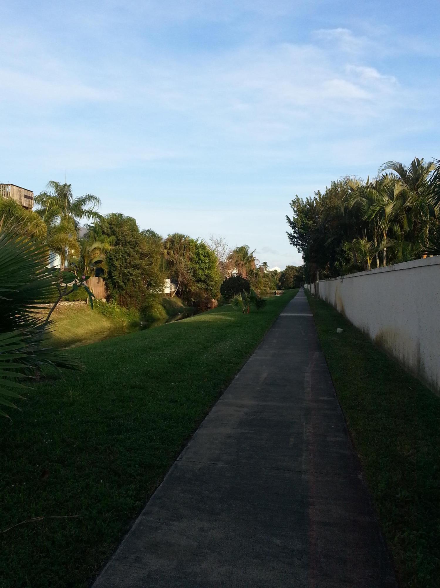 169 Seabreeze Circle Jupiter, FL 33477 - Photo 24 of 25 Lighted Walk Way to the Beach