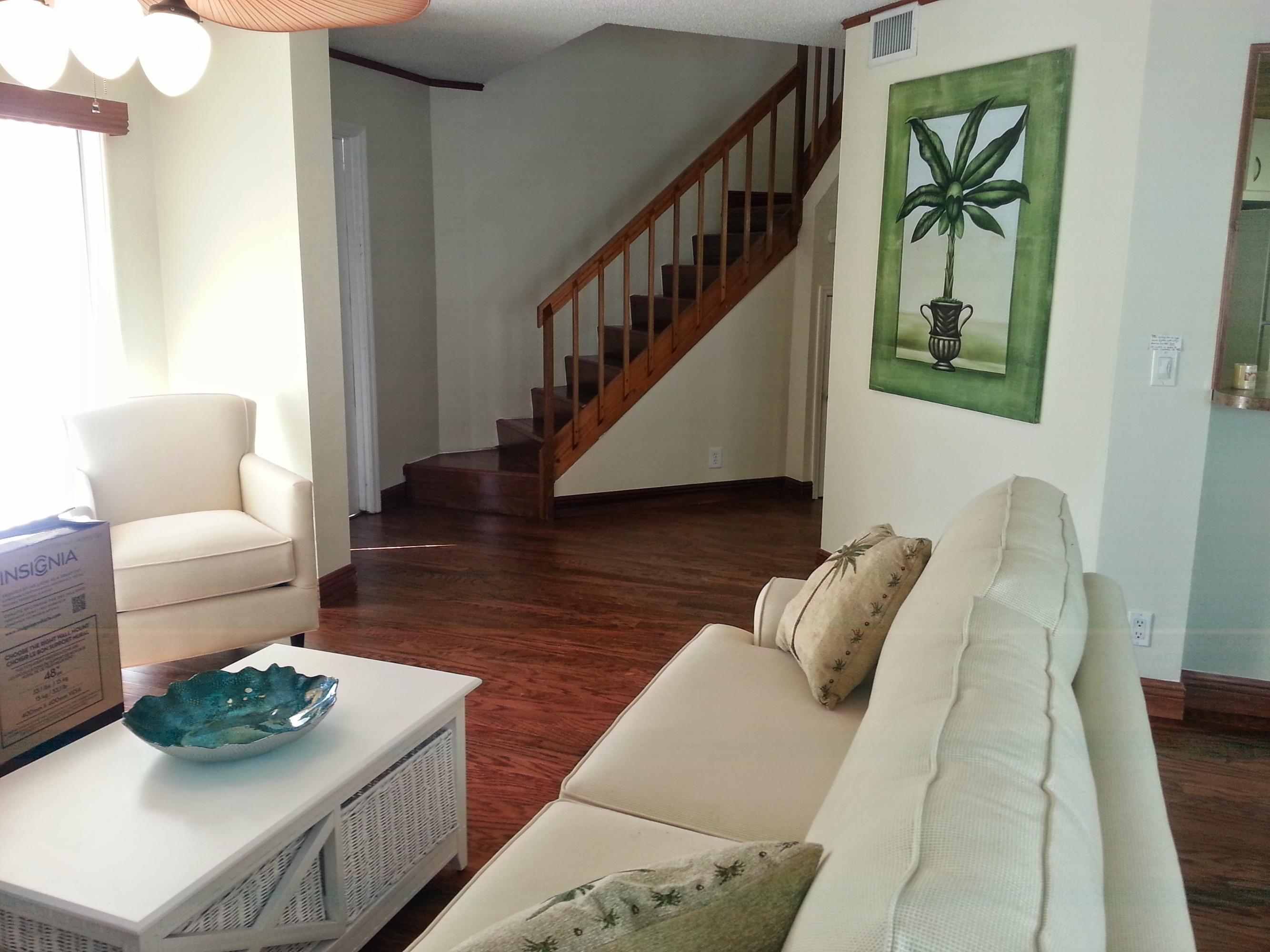 169 Seabreeze Circle Jupiter, FL 33477 - Photo 9 of 25 Family Room and Stairs