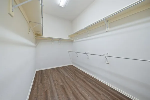 a view of a room with racks on the wall