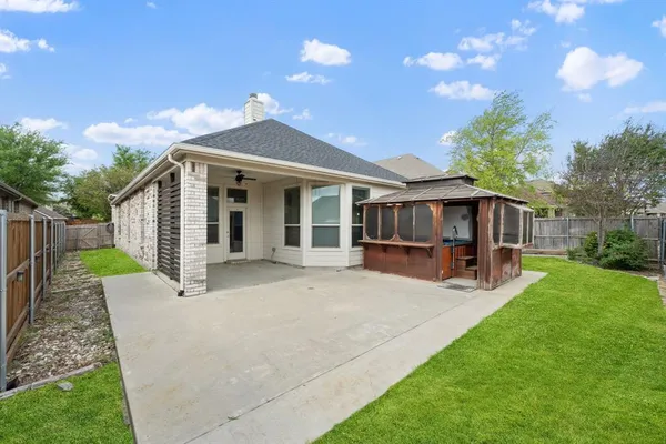 a view of a backyard with a garden