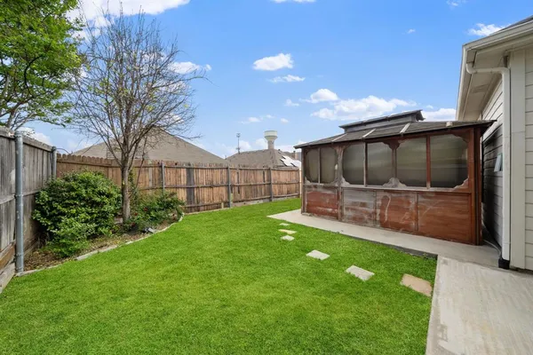 a picture of a bathroom with a shower