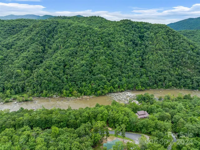 a view of a lake with a building in the background