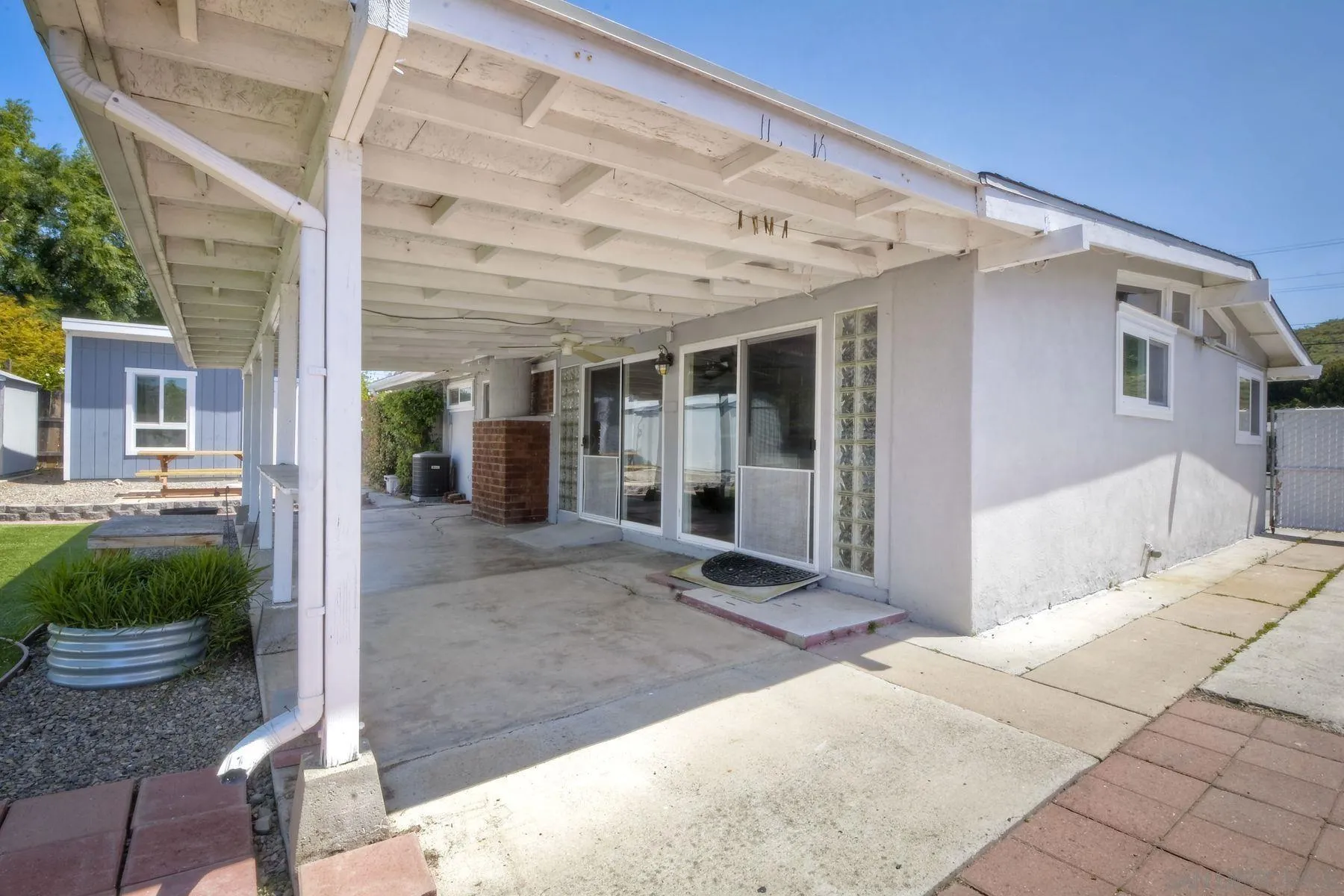 13816 Tobiasson Road Poway, CA 92064 - Photo 35 of 37 a front view of a house with garden