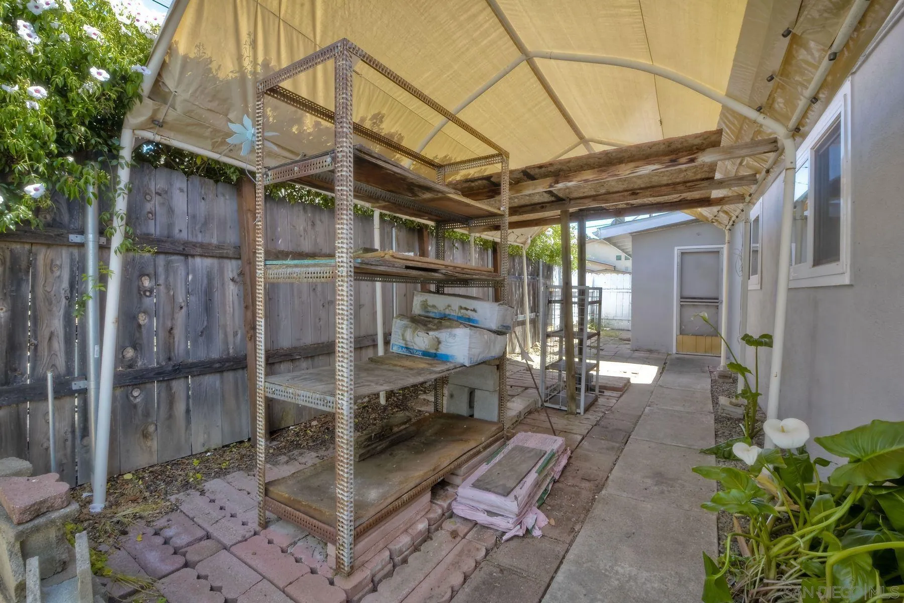 13816 Tobiasson Road Poway, CA 92064 - Photo 36 of 37 a view of patio with table and chairs potted plants