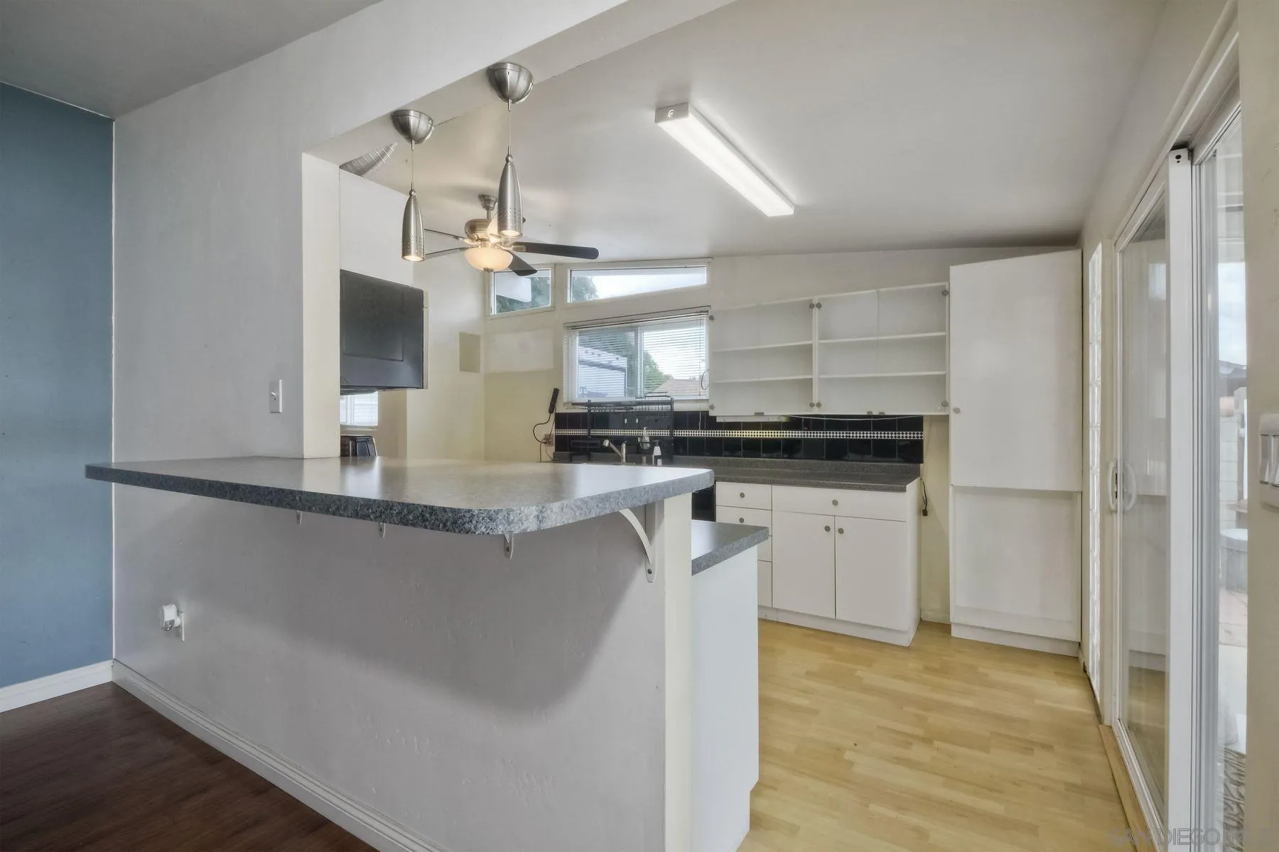 13816 Tobiasson Road Poway, CA 92064 - Photo 8 of 37 a kitchen with a sink and cabinets