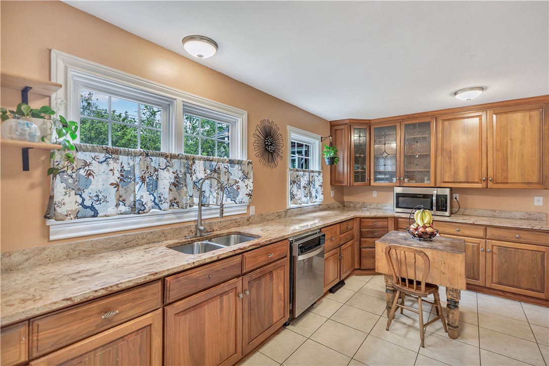 25 Central Avenue Honea Path, SC 29654 - Photo 11 of 29 This spacious kitchen offers ample countertop space and a functional layout.