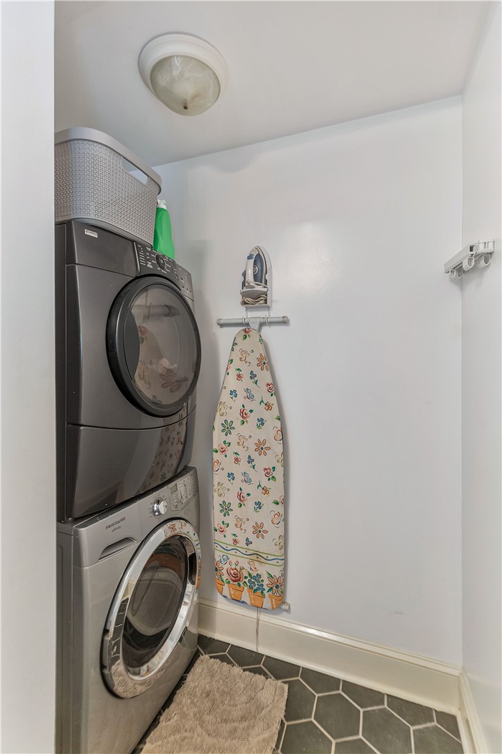 25 Central Avenue Honea Path, SC 29654 - Photo 19 of 29 This dedicated laundry area offers convenient and efficient clothes care with a stacked washer and dryer.