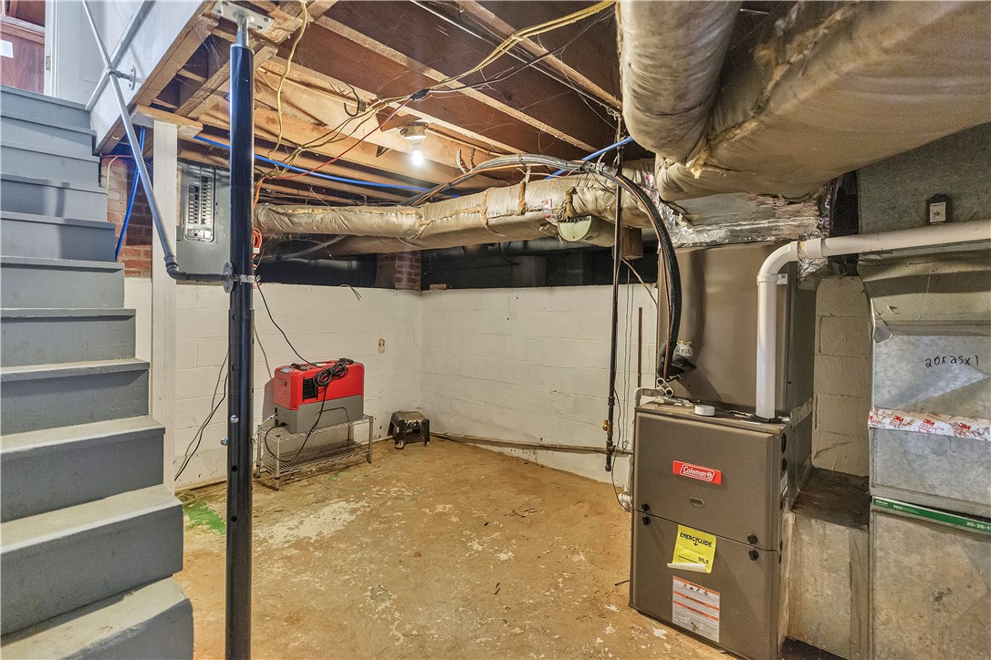 25 Central Avenue Honea Path, SC 29654 - Photo 20 of 29 This spacious basement offers ample storage and potential for future customization.