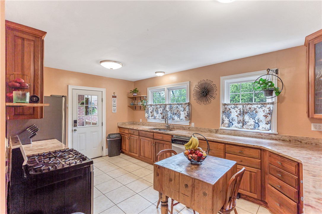 25 Central Avenue Honea Path, SC 29654 - Photo 2 of 29 This cozy kitchen features abundant cabinetry and durable flooring, perfect for daily living and entertaining.