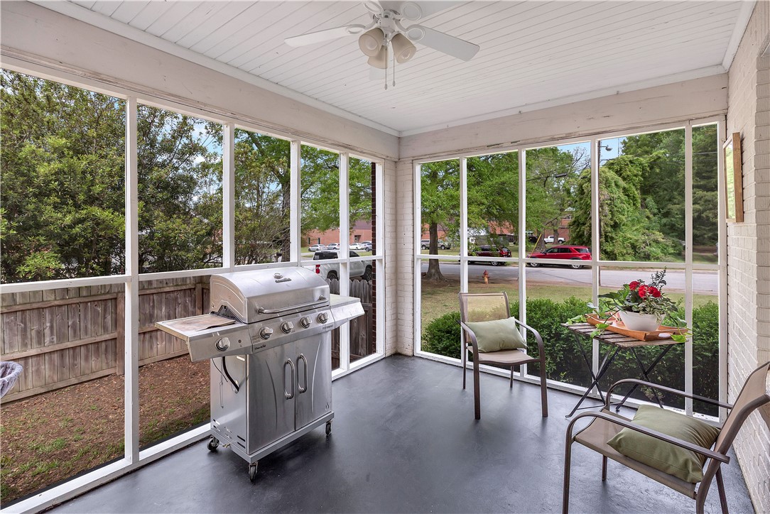 25 Central Avenue Honea Path, SC 29654 - Photo 22 of 29 This inviting screened porch provides a perfect spot for relaxation and outdoor cooking.