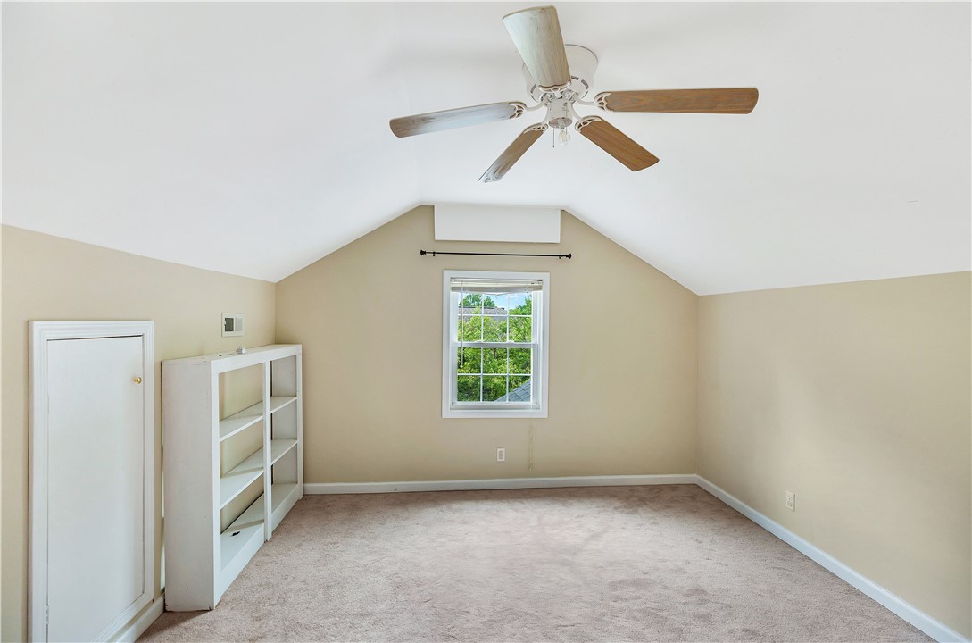 25 Central Avenue Honea Path, SC 29654 - Photo 24 of 36 This spacious room offers comfort and versatility, featuring ample natural light and vaulted ceilings.