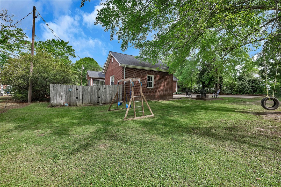 25 Central Avenue Honea Path, SC 29654 - Photo 28 of 29 This spacious yard offers ample room for outdoor activities and gatherings.