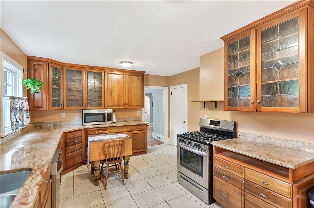25 Central Avenue Honea Path, SC 29654 - Photo 10 of 36 This bright kitchen features ample counter space and classic cabinetry.