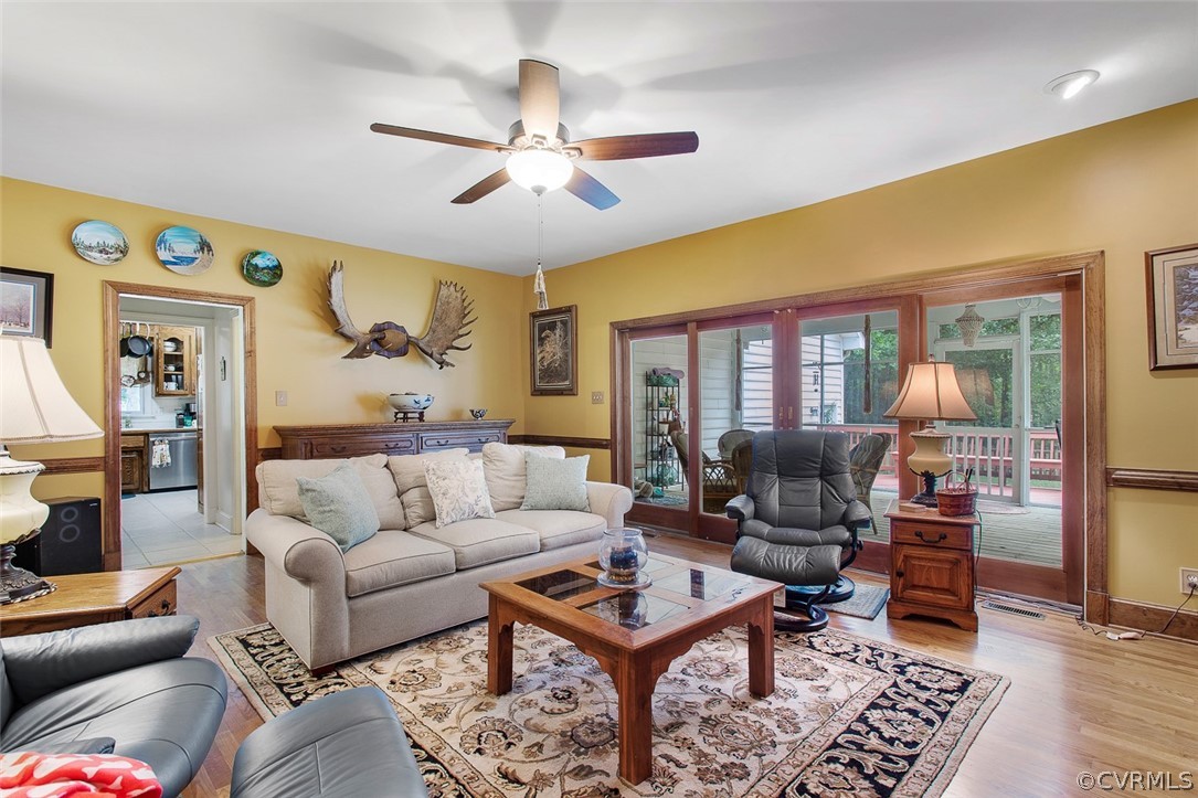12625 2nd Branch Road Chesterfield, VA 23838 - Photo 11 of 49 Family room leads out onto screened porch