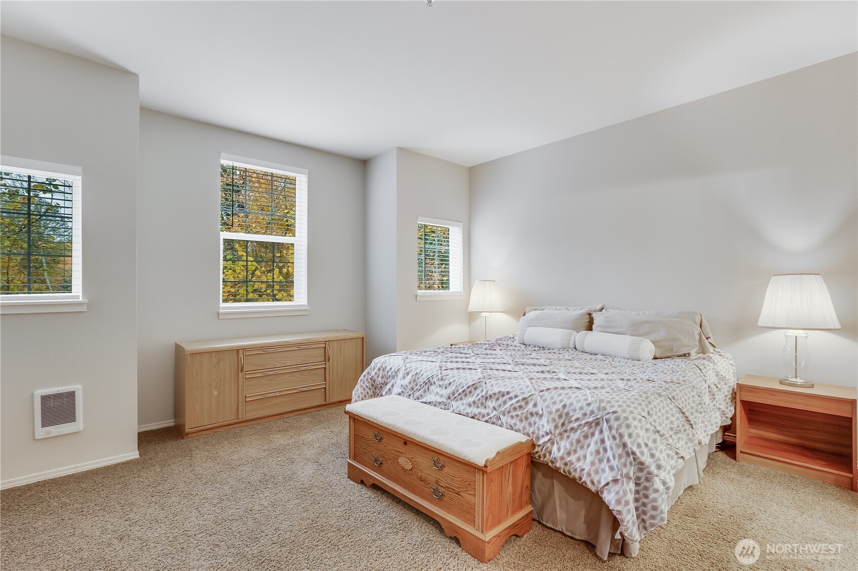 1800 Northeast 40th Street, Unit G5 Renton, WA 98056 - Photo 19 of 30 a bedroom with a bed and a window