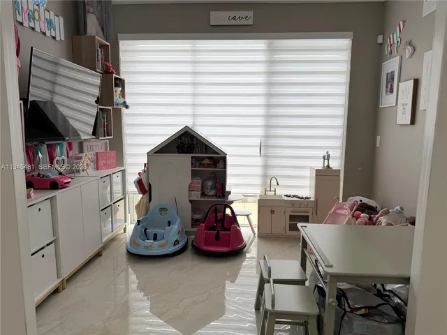 a room with furniture and storage