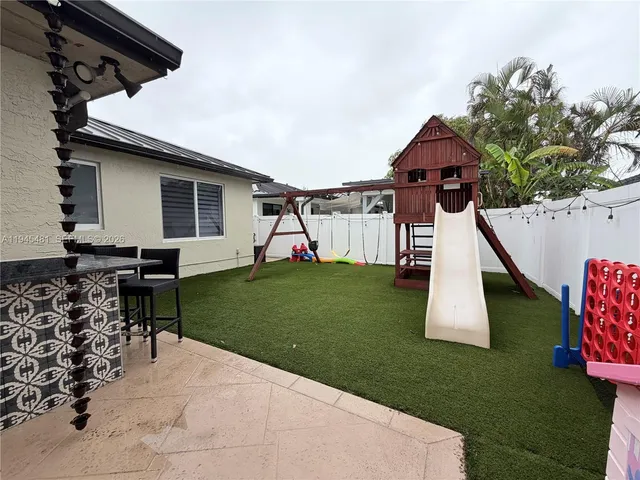 a view of group of people in a yard