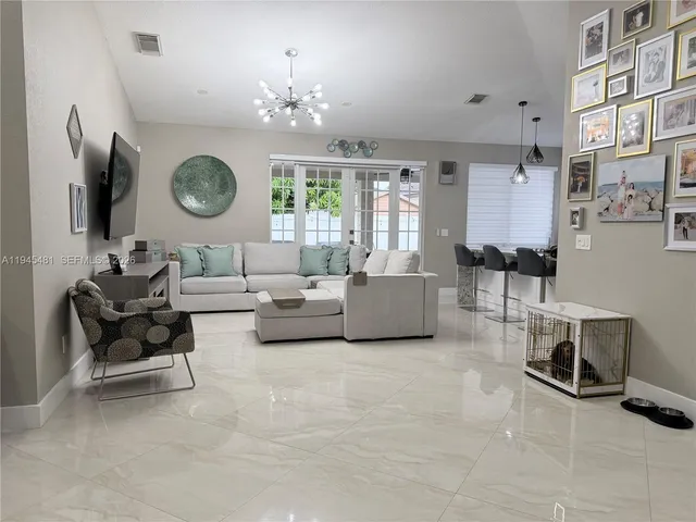 a view of a balcony with furniture