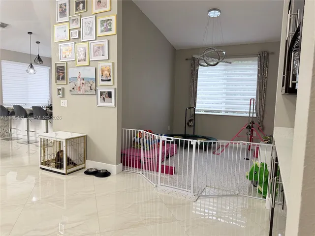 a living room with furniture and window