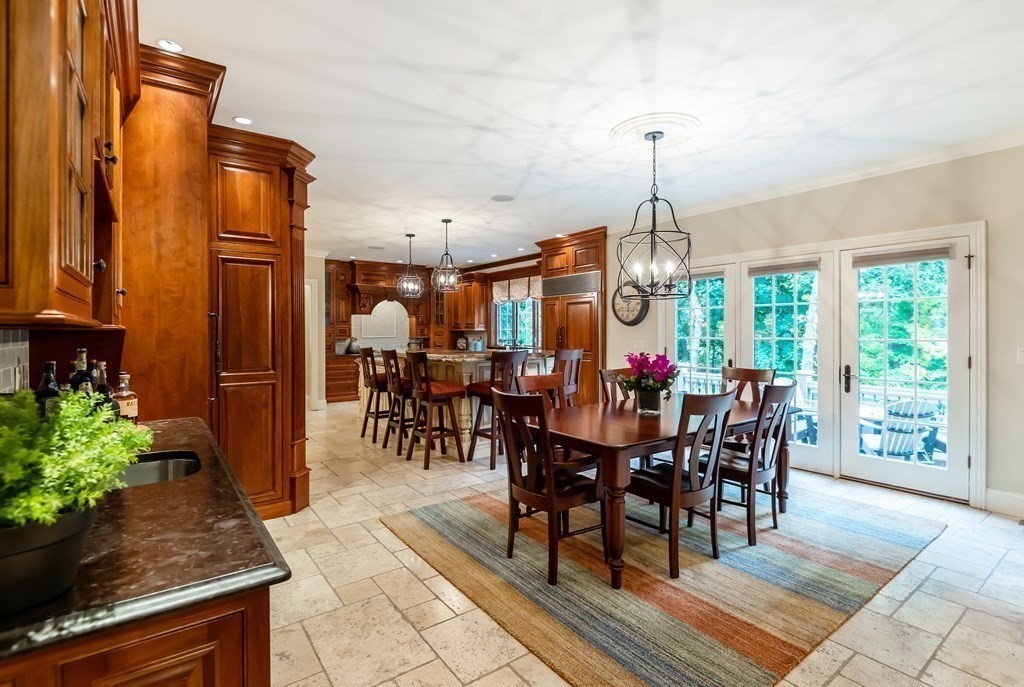 9 Prides Circle Andover, MA 01810 - Photo 12 of 42 a view of a dining room with furniture window and wooden floor