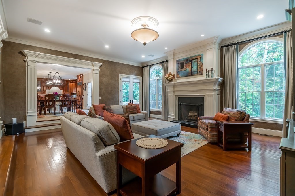9 Prides Circle Andover, MA 01810 - Photo 18 of 42 a living room with furniture and a fireplace