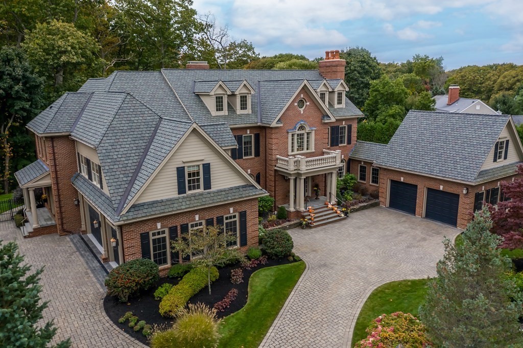 9 Prides Circle Andover, MA 01810 - Photo 2 of 42 an aerial view of a house with a yard