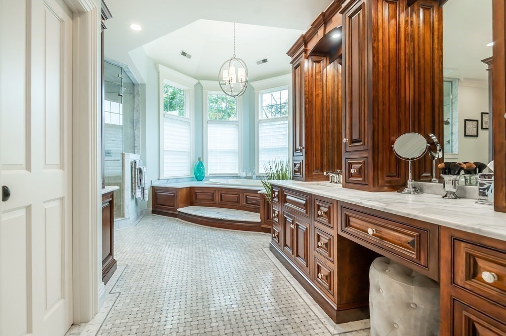 9 Prides Circle Andover, MA 01810 - Photo 25 of 42 a kitchen with stainless steel appliances a sink and cabinets