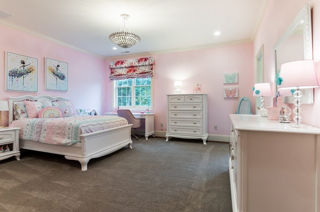 9 Prides Circle Andover, MA 01810 - Photo 27 of 42 a bedroom with a bed dresser and a window