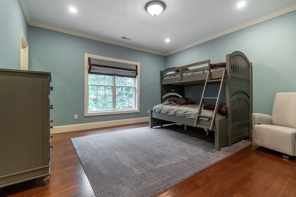 9 Prides Circle Andover, MA 01810 - Photo 31 of 42 a bedroom with furniture and a window