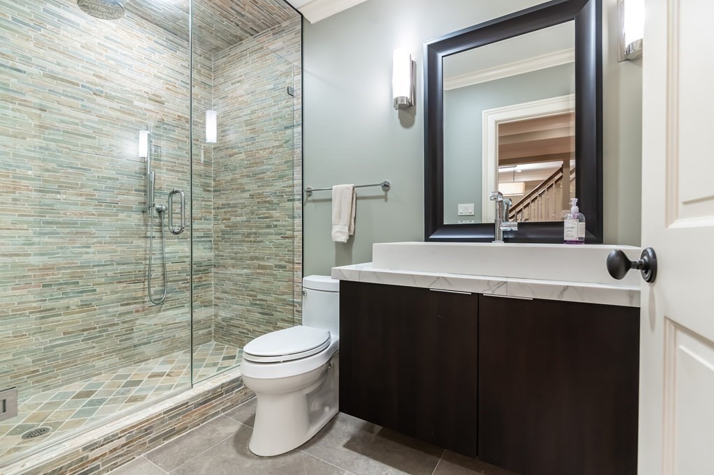 9 Prides Circle Andover, MA 01810 - Photo 37 of 42 a bathroom with a sink toilet and shower