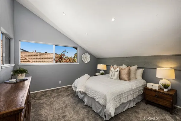 a front view of a house with outdoor seating