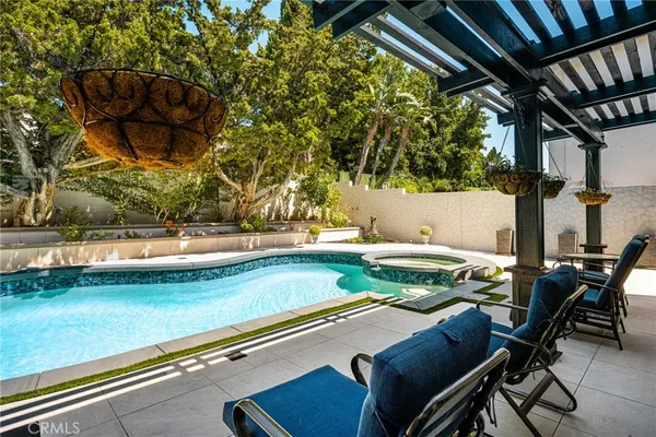 a view of backyard with seating space