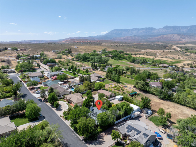 246 West Mount Charm Road Toquerville, UT 84774 - Photo 64 of 70 Aerial perspective of suburban area with a mountain backdrop