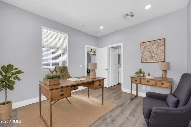 a view of an empty room with a fireplace