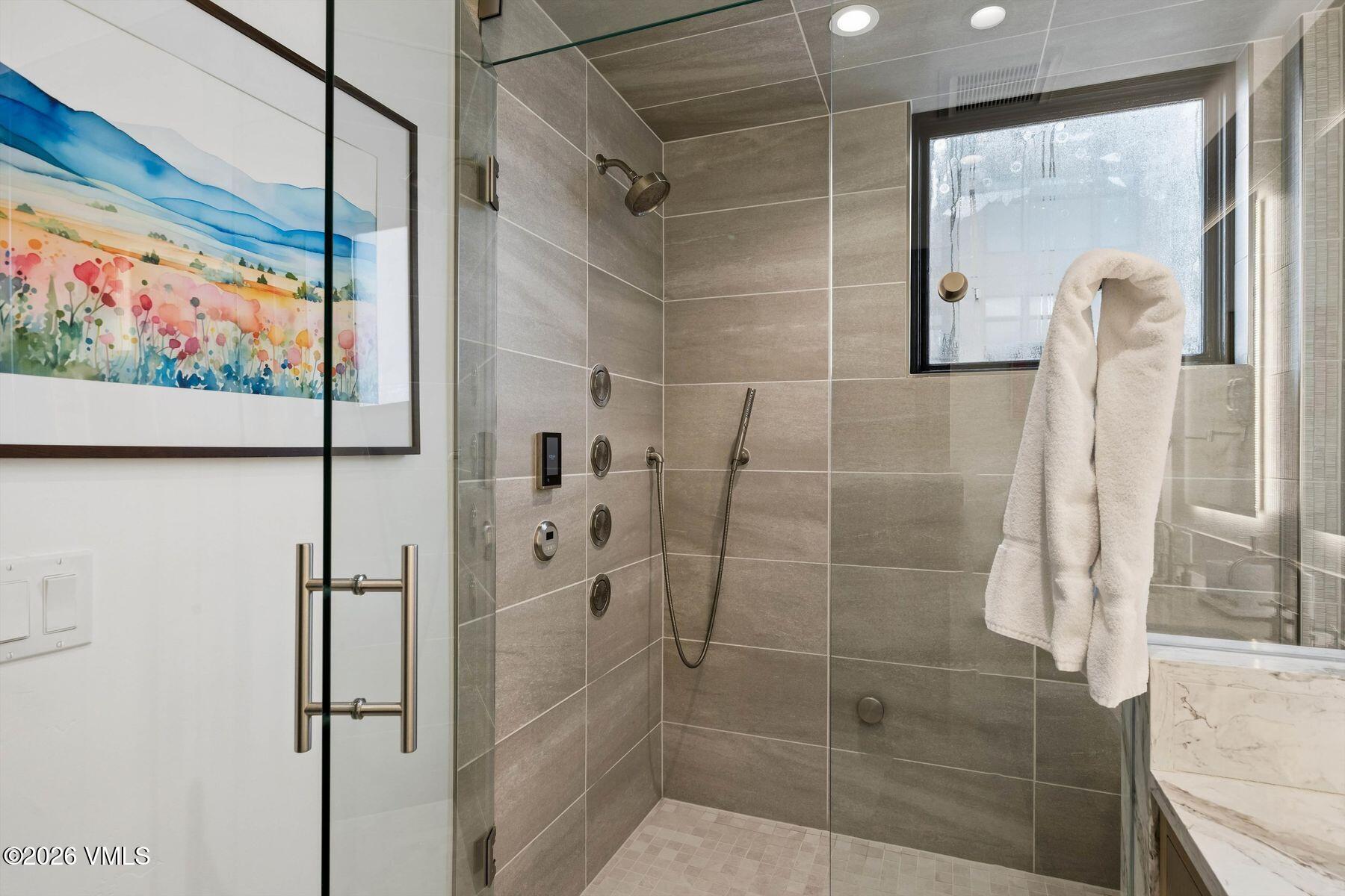 42 Riverfront Lane, Unit 508 Avon, CO 81620 - Photo 20 of 57 a bathroom with a shower