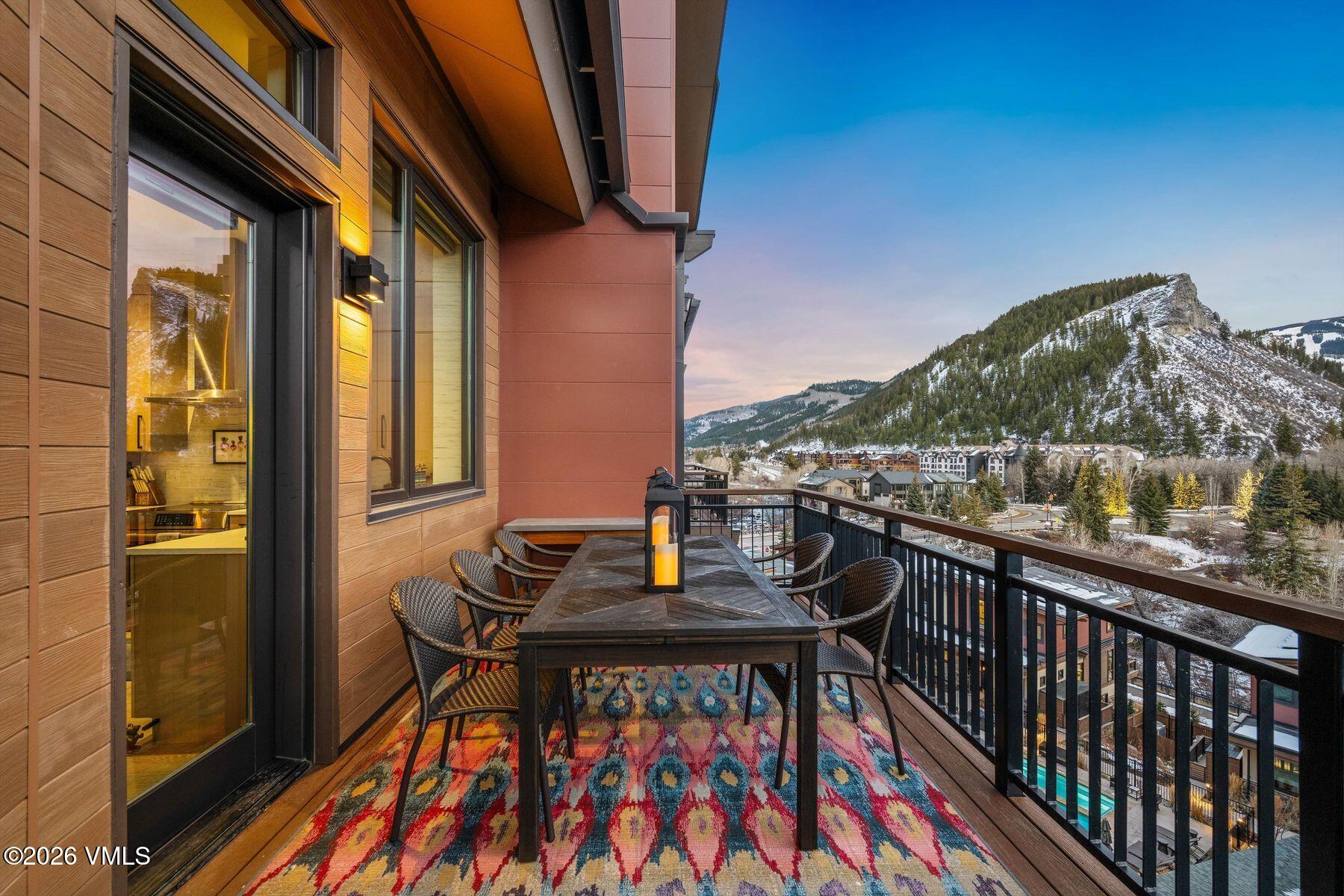 42 Riverfront Lane, Unit 508 Avon, CO 81620 - Photo 34 of 57 a view of balcony with two chairs and a potted plant