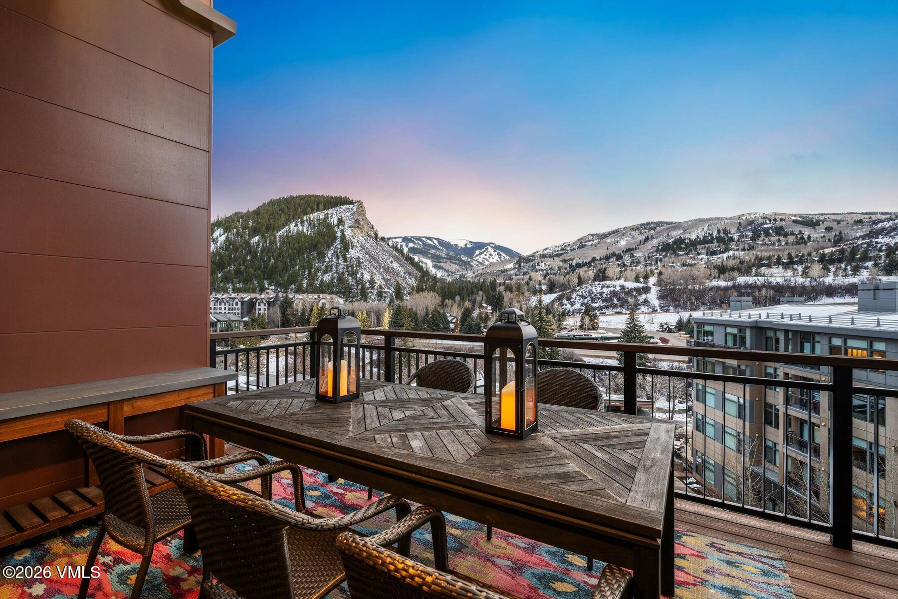 42 Riverfront Lane, Unit 508 Avon, CO 81620 - Photo 5 of 57 a view of city from balcony with seating space
