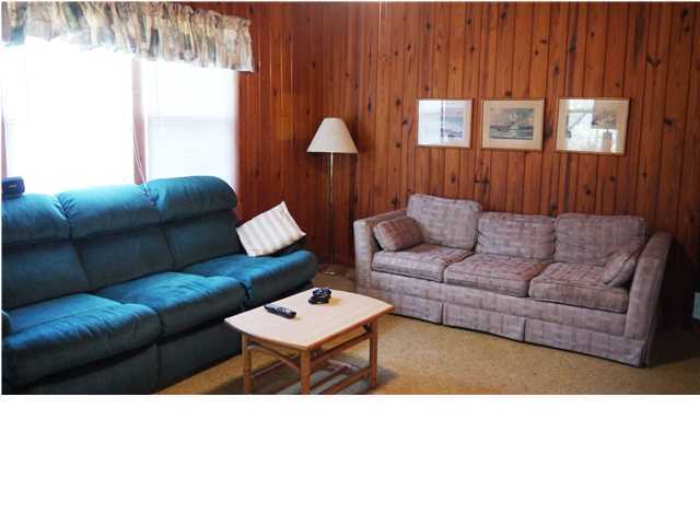 160 Pompano Street Inlet Beach, FL 32461 - Photo 8 of 11 a living room with furniture and a window