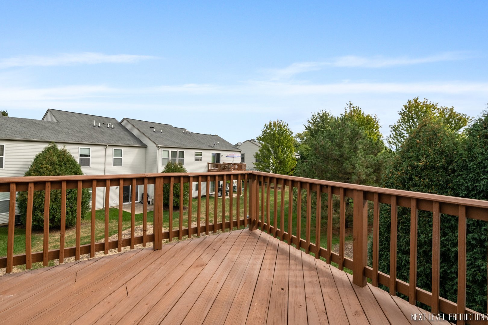 533 Metropolitan Street Aurora, IL 60502 - Photo 16 of 18 a view of wooden balcony with wooden floor